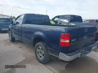 2004 Ford F-150 XL with VIN 1FTRF12W74NC53337, listed as a IAAI auction lot 41859392 with 219,829 mi miles. Bid and sale history available at carsss.com. Image 3.