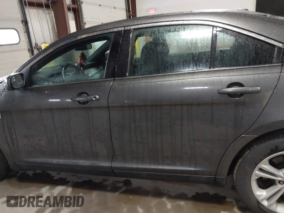 2015 Ford Taurus SEL with VIN 1FAHP2E87FG207029, listed as a IAAI auction lot 41752890 with 119,858 mi miles and . Bid and sale history available at carsss.com. Image 14.