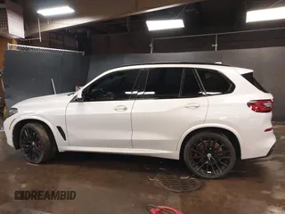 2022 BMW X5 M50i with VIN 5UXJU4C01N9M81857, listed as a IAAI auction lot 41592857 with 15,122 mi miles. Bid and sale history available at carsss.com. Image 14.
