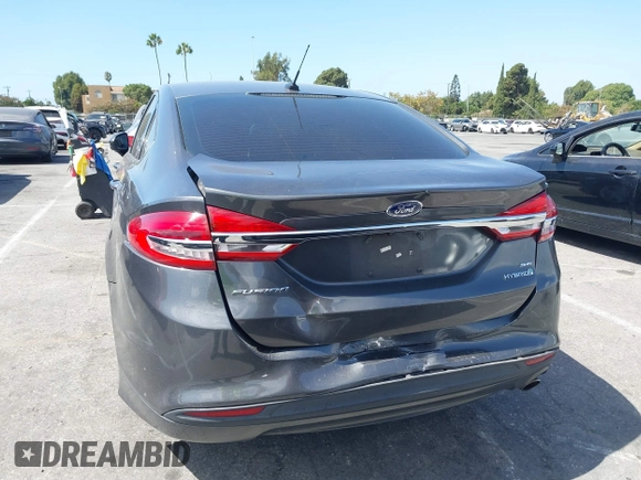 2018 Ford Fusion Hybrid SE with VIN 3FA6P0LU4JR261594, listed as a IAAI auction lot 40360797 with 128,533 mi miles. Bid and sale history available at carsss.com. Image 16.