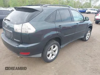 2006 Lexus RX 330 with VIN 2T2HA31U56C090677, listed as a IAAI auction lot 42182540 with 216,676 mi miles. Bid and sale history available at carsss.com. Image 4.