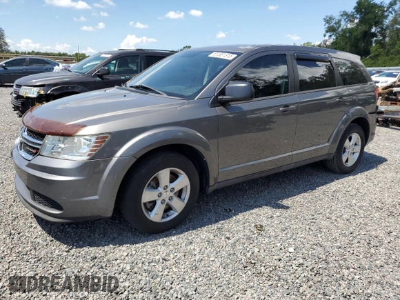 2013 Dodge Journey American Value with VIN 3C4PDCAB8DT566999, listed as a Copart auction lot 61361315 with 183,897 mi miles and Salvage title. Bid and sale history available at DreamBid. Image 1.
