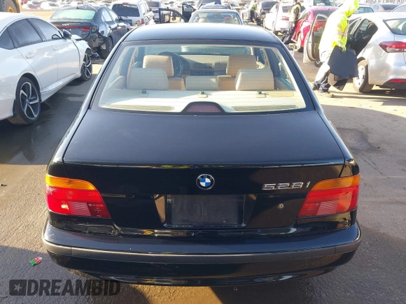 2000 BMW 5 Series 528iA with VIN WBADM6343YGU12629, listed as a IAAI auction lot 41963814 with 206,922 mi miles. Bid and sale history available at carsss.com. Image 16.