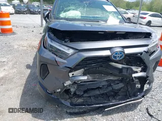 2023 Toyota RAV4 Hybrid SE with VIN JTM16RFV9PD113152, listed as a IAAI auction lot 42177056 with 41,204 mi miles and . Bid and sale history available at DreamBid. Image 6.