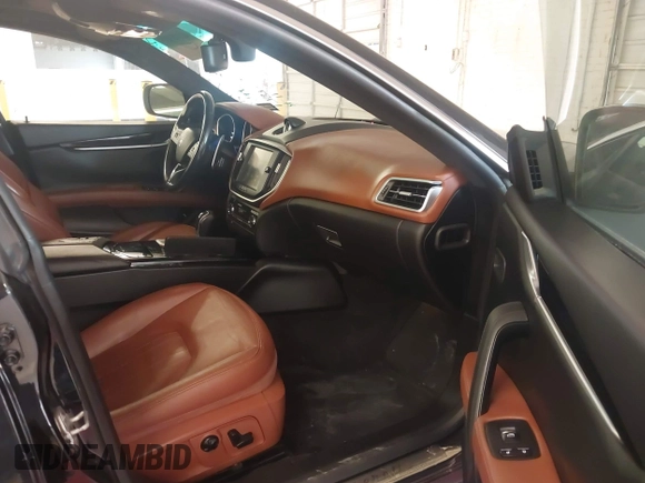 2016 Maserati Ghibli S Q4 with VIN ZAM57RTA3G1178723, listed as a IAAI auction lot 42041935 with 129,647 mi miles and . Bid and sale history available at DreamBid. Image 5.