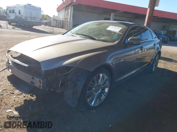2011 Jaguar XJ XJL with VIN SAJWA2GB0BLV13469, listed as a IAAI auction lot 41836620 with 115,924 mi miles and . Bid and sale history available at DreamBid. Image 2.