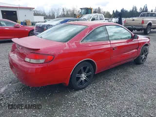 1999 Toyota Solara SE with VIN 2T1CF22P4XC101463, listed as a IAAI auction lot 41944204 with 297,674 mi miles. Bid and sale history available at carsss.com. Image 4.