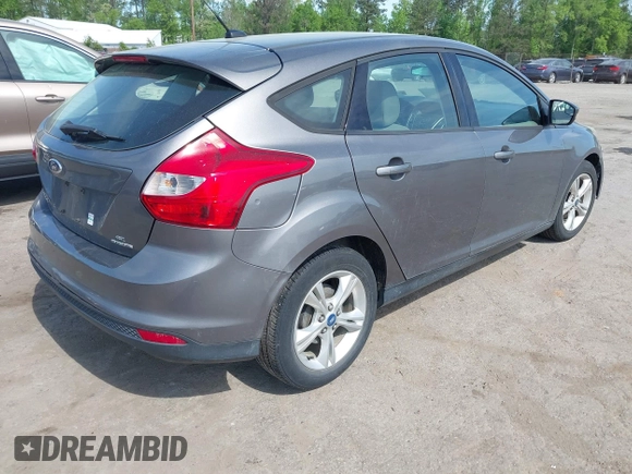 2013 Ford Focus SE with VIN 1FADP3K20DL193712, listed as a IAAI auction lot 42112183 with 113,500 mi miles. Bid and sale history available at carsss.com. Image 4.