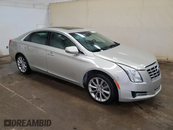 2013 Cadillac XTS Luxury with VIN 2G61R5S33D9166106, listed as a Copart auction lot 50535485 with 129,745 mi miles and Clean title. Bid and sale history available at DreamBid. Image 4.