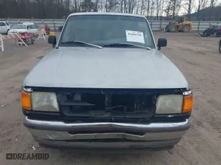 1996 Ford Ranger XL with VIN 1FTCR14A2TPA33525, listed as a IAAI auction lot 41602295 with 209,805 mi miles. Bid and sale history available at carsss.com. Image 6.