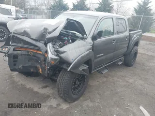 2012 Toyota Tacoma z VIN 3TMLU4EN9CM095110, wystawiony jako IAAI lot #41935207 z przebiegiem 177 543 mil mil oraz . Historia ofert i sprzedaży dostępna na DreamBid. Obrazek 17.