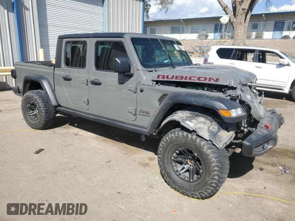 2020 Jeep Gladiator Rubicon with VIN 1C6JJTBG9LL163270, listed as a Copart auction lot 53654005 with 74,744 mi miles and Salvage title. Bid and sale history available at DreamBid. Image 4.