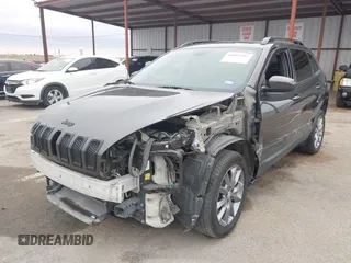 2018 Jeep Cherokee Latitude with VIN 1C4PJLCB1JD588916, listed as a IAAI auction lot 41019397 with 135,929 mi miles. Bid and sale history available at carsss.com. Image 2.