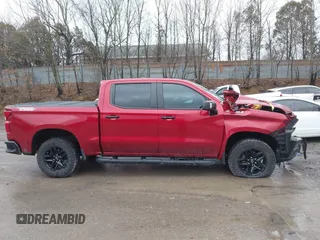 2021 Chevrolet Silverado 1500 LT Trail Boss with VIN 3GCPYFEL0MG161771, listed as a IAAI auction lot 41671905 with 44,047 mi miles and . Bid and sale history available at DreamBid. Image 14.