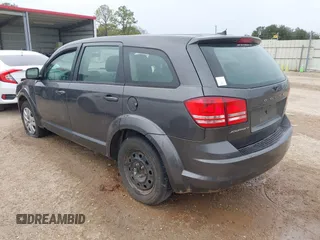 2014 Dodge Journey American Value Pkg with VIN 3C4PDCAB7ET247286, listed as a IAAI auction lot 41214056 with 205,222 mi miles. Bid and sale history available at carsss.com. Image 3.