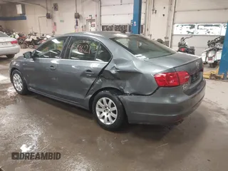 2014 Volkswagen Jetta TDI w/Premium with VIN 3VWLL7AJ4EM425825, listed as a IAAI auction lot 41519621 with 154,486 mi miles and . Bid and sale history available at DreamBid. Image 3.