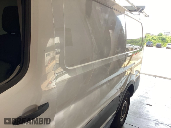 2015 Ford Transit Cargo with VIN 1FTNR1ZM1FKA44965, listed as a IAAI auction lot 42679340 with 151,641 mi miles and . Bid and sale history available at DreamBid. Image 23.