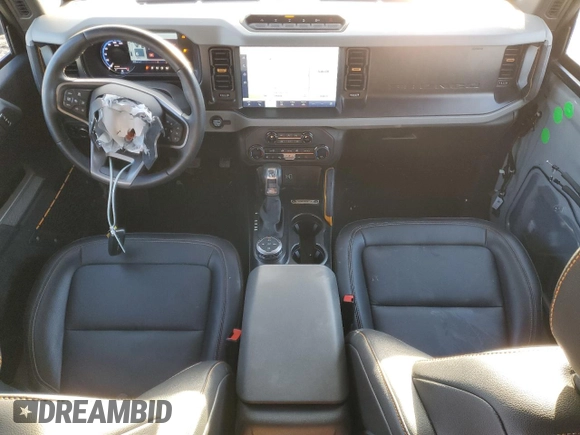 2023 Ford Bronco with VIN 1FMEE5DP8PLB93420, listed as a Copart auction lot 42247495 with 8,802 mi miles and Salvage Title. Bid and sale history available at DreamBid. Image 8.