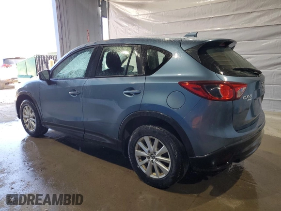 2015 Mazda CX-5 Sport with VIN JM3KE4BY9F0552942, listed as a Copart auction lot 54750245 with 129,700 mi miles and Salvage title. Bid and sale history available at DreamBid. Image 2.