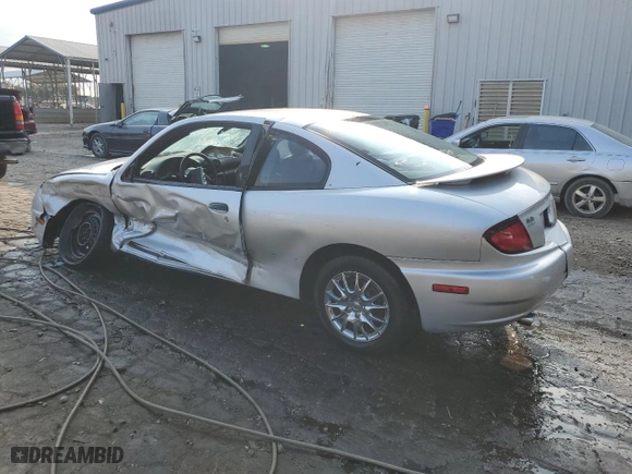 2004 Pontiac Sunfire with VIN 1G2JB12F247165264, listed as a Copart auction lot 77872304 with 128,428 mi miles and Salvage Title. Bid and sale history available at carsss.com. Image 2.