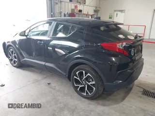 2020 Toyota C-HR LE with VIN JTNKHMBX1L1077957, listed as a IAAI auction lot 42159765 with 83,138 mi miles and . Bid and sale history available at DreamBid. Image 3.