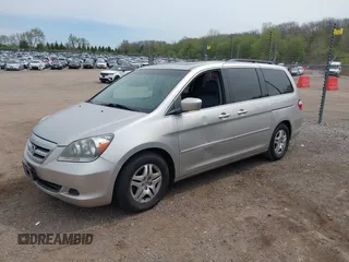 2007 Honda Odyssey EX-L z VIN 5FNRL38677B451060, wystawiony jako IAAI lot #42161554 z przebiegiem 190 147 mil mil oraz . Historia ofert i sprzedaży dostępna na DreamBid. Obrazek 2.