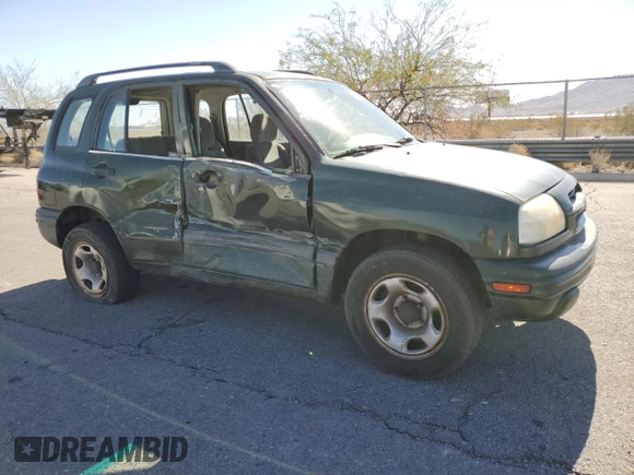 2000 Suzuki Vitara JX z VIN 2S3TD52V1Y6108459, wystawiony jako Copart lot #75526644 z przebiegiem 263 433 mil mil oraz Szkody całkowita. Historia ofert i sprzedaży dostępna na DreamBid. Obrazek 4.