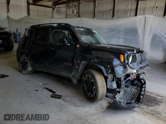 2017 Jeep Renegade Trailhawk with VIN ZACCJBCB9HPE56121, listed as a Copart auction lot 55655485 with 127,661 mi miles and Salvage title. Bid and sale history available at DreamBid. Image 4.