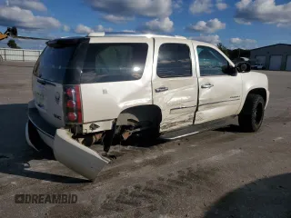 2014 GMC Yukon Denali with VIN 1GKS2EEF0ER141638, listed as a Copart auction lot 74247634 with 160,671 mi miles and Salvage Title. Bid and sale history available at carsss.com. Image 3.
