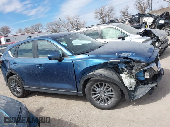 2018 Mazda CX-5 Sport with VIN JM3KFBBM8J0400741, listed as a IAAI auction lot 41860323 with 54,911 mi miles. Bid and sale history available at carsss.com. Image 13.