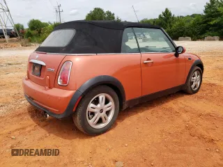 2006 MINI Convertible with VIN WMWRF335X6TF64910, listed as a Copart auction lot 60222215 with 85,761 mi miles and Salvage title. Bid and sale history available at DreamBid. Image 3.