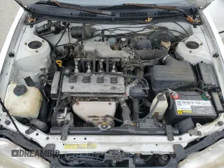 1997 Geo Prizm z VIN 1Y1SK526XVZ437486, wystawiony jako Copart lot #86422384 z przebiegiem 404 485 mil mil oraz Tytuł czysty. Historia ofert i sprzedaży dostępna na DreamBid. Obrazek 11.