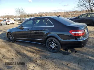 2011 Mercedes-Benz E 550 Luxury with VIN WDDHF9AB2BA264183, listed as a Copart auction lot 46336995 with 184,659 mi miles and Salvage title. Bid and sale history available at DreamBid. Image 2.