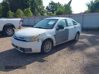 2008 Ford Focus SE with VIN 1FAHP35N08W296432, listed as a IAAI auction lot 42520880 with 195,266 mi miles and . Bid and sale history available at DreamBid. Image 2.