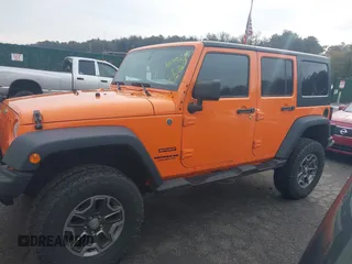 2013 Jeep Wrangler Unlimited Sport z VIN 1C4BJWDG7DL522421, wystawiony jako IAAI lot #41492425 z przebiegiem 55 921 mil mil oraz . Historia ofert i sprzedaży dostępna na DreamBid. Obrazek 14.