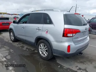 2014 Kia Sorento LX with VIN 5XYKTCA69EG496907, listed as a IAAI auction lot 41789120 with 166,644 mi miles and . Bid and sale history available at carsss.com. Image 3.