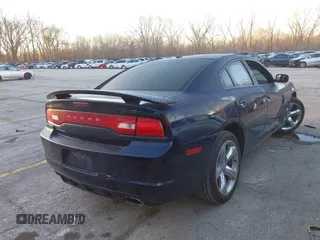 2014 Dodge Charger SXT with VIN 2C3CDXHGXEH330845, listed as a IAAI auction lot 41858714 with 161,541 mi miles. Bid and sale history available at carsss.com. Image 4.