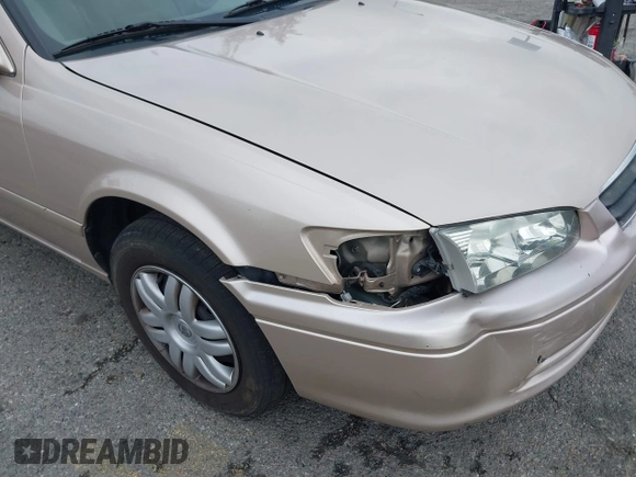2001 Toyota Camry CE with VIN 4T1BG22K81U075758, listed as a IAAI auction lot 42024950 with 107,439 mi miles. Bid and sale history available at carsss.com. Image 6.