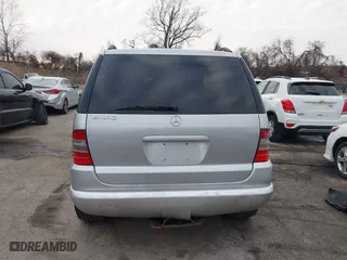 1999 Mercedes-Benz M-Class with VIN 4JGAB72E4XA113675, listed as a IAAI auction lot 41554604 with 230,092 mi miles. Bid and sale history available at carsss.com. Image 16.