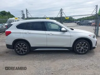 2021 BMW X1 xDrive28i with VIN WBXJG9C07M5U21337, listed as a IAAI auction lot 42590859 with 35,934 mi miles and . Bid and sale history available at DreamBid. Image 13.