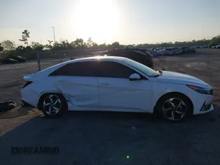 2023 Hyundai Elantra Limited z VIN KMHLN4AJ2PU074306, wystawiony jako IAAI lot #42277954 z przebiegiem 21 487 mil mil oraz . Historia ofert i sprzedaży dostępna na DreamBid. Obrazek 13.