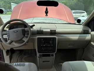 2005 Ford Freestar SES с VIN 2FMZA57605BA82597, выставлен на аукционе Copart как лот 61200505 с пробегом 188 210 миль миль и Чистый • Clean title. История ставок и продаж доступна на DreamBid. Изображение 9.