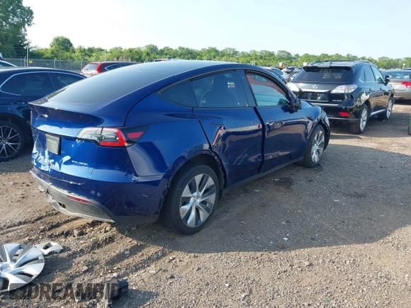 2023 Tesla Model Y Long Range with VIN 7SAYGDEE0PF671726, listed as a IAAI auction lot 42393616 with Not provided miles and . Bid and sale history available at DreamBid. Image 4.