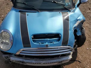 2005 MINI Hardtop S z VIN WMWRE33505TL10315, wystawiony jako Copart lot #55234535 z przebiegiem 148 197 mil mil oraz Szkody całkowita. Historia ofert i sprzedaży dostępna na DreamBid. Obrazek 11.