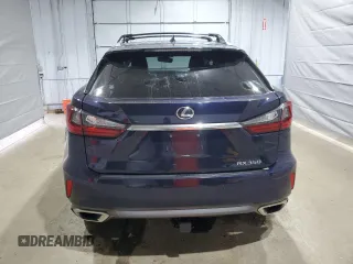 2016 Lexus RX 350 z VIN JTJBZMCAXG2005373, wystawiony jako Copart lot #52017895 z przebiegiem 144 354 mil mil oraz Szkoda całkowita • Salvage title. Historia ofert i sprzedaży dostępna na DreamBid. Obrazek 6.