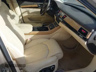 2012 Audi A8 z VIN WAURVAFD3CN024063, wystawiony jako IAAI lot #41706508 z przebiegiem Nie podano mil oraz . Historia ofert i sprzedaży dostępna na DreamBid. Obrazek 5.