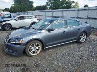2014 Volkswagen Passat SE with VIN 1VWBT7A34EC037699, listed as a Copart auction lot 62981975 with 70,978 mi miles and Salvage title. Bid and sale history available at DreamBid. Image 1.