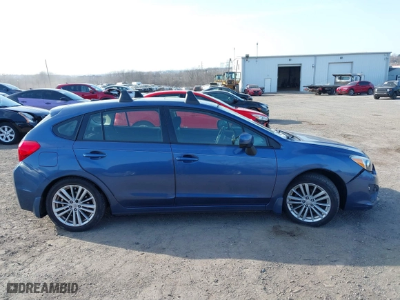 2012 Subaru Impreza Wagon 2.0i Premium with VIN JF1GPAF65CH208057, listed as a IAAI auction lot 41774058 with 93,335 mi miles. Bid and sale history available at carsss.com. Image 13.