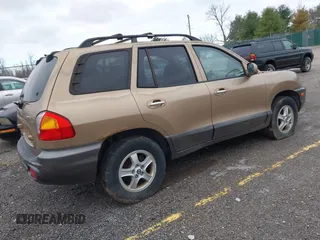 2004 Hyundai Santa Fe GLS with VIN KM8SC13E74U685895, listed as a IAAI auction lot 41813226 with 195,217 mi miles. Bid and sale history available at carsss.com. Image 4.