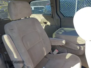 2005 Kia Sedona LX with VIN KNDUP132756764528, listed as a IAAI auction lot 41709414 with 999,999 mi miles. Bid and sale history available at carsss.com. Image 8.